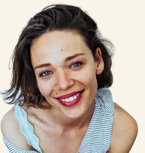 Cheerful young woman smiles into the camera