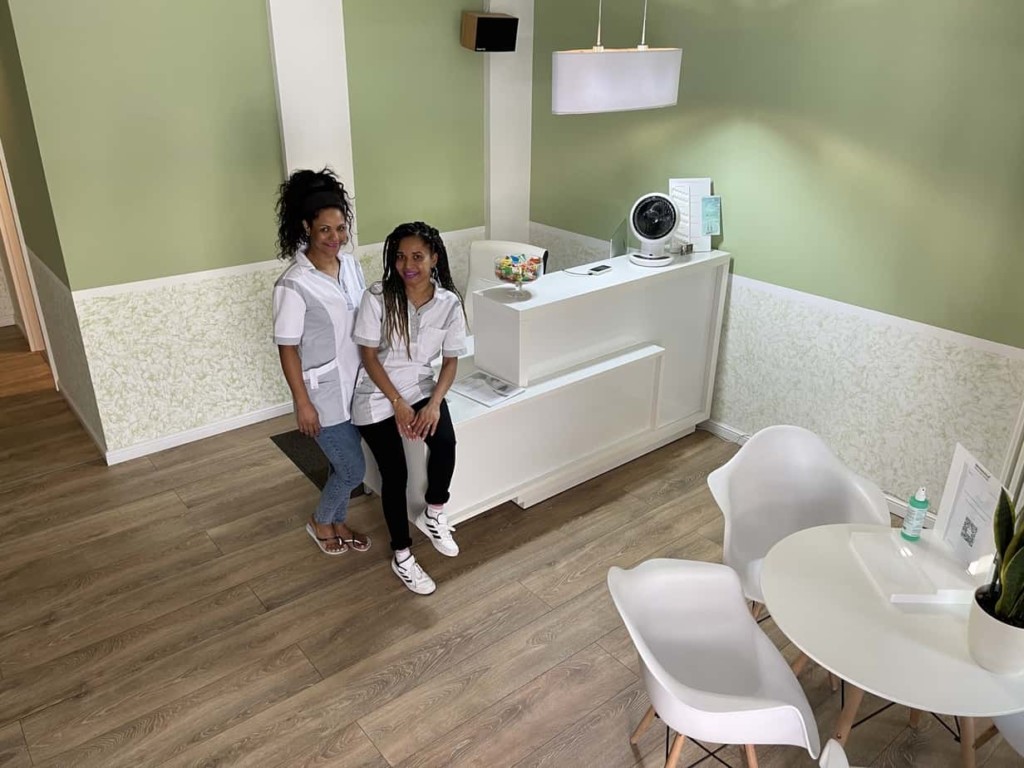 Lili and Neia at the reception desk